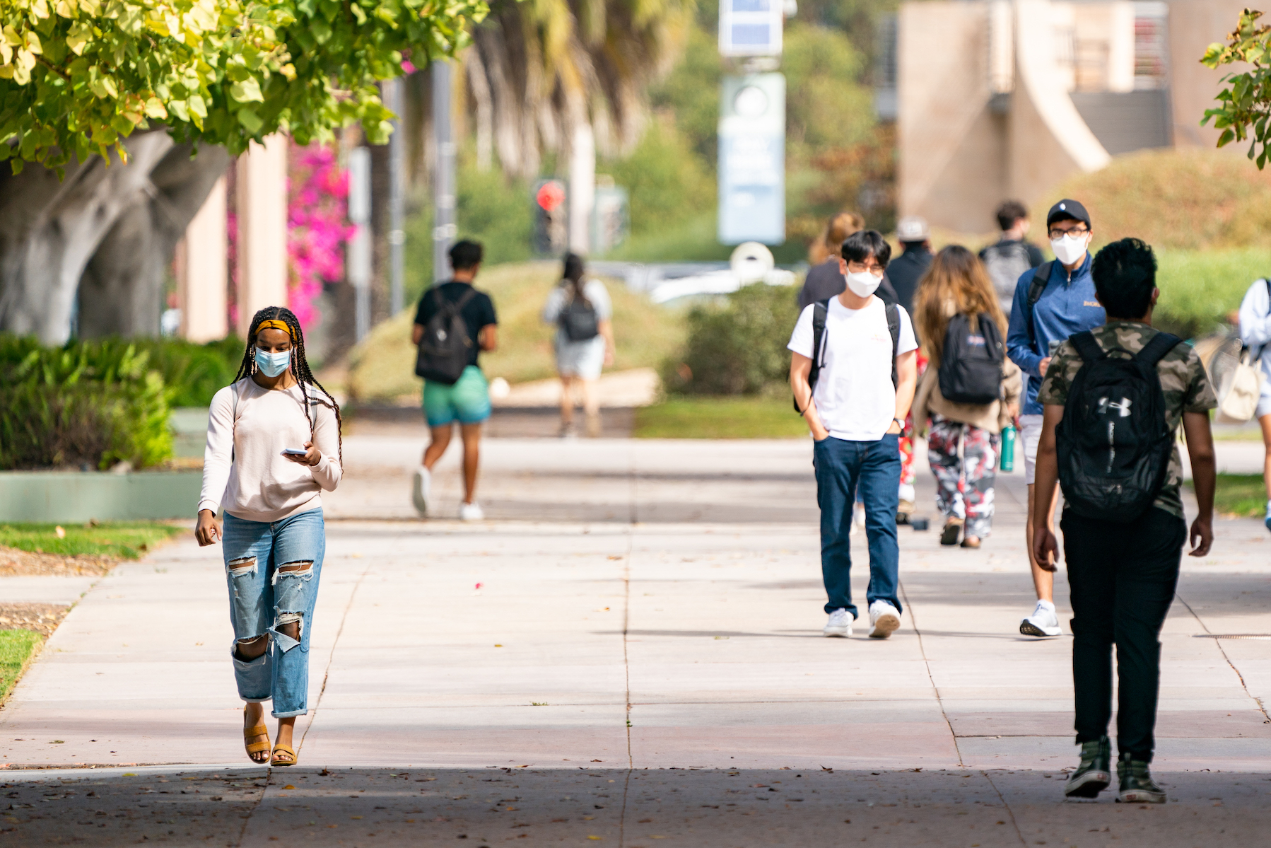 students walking on campus