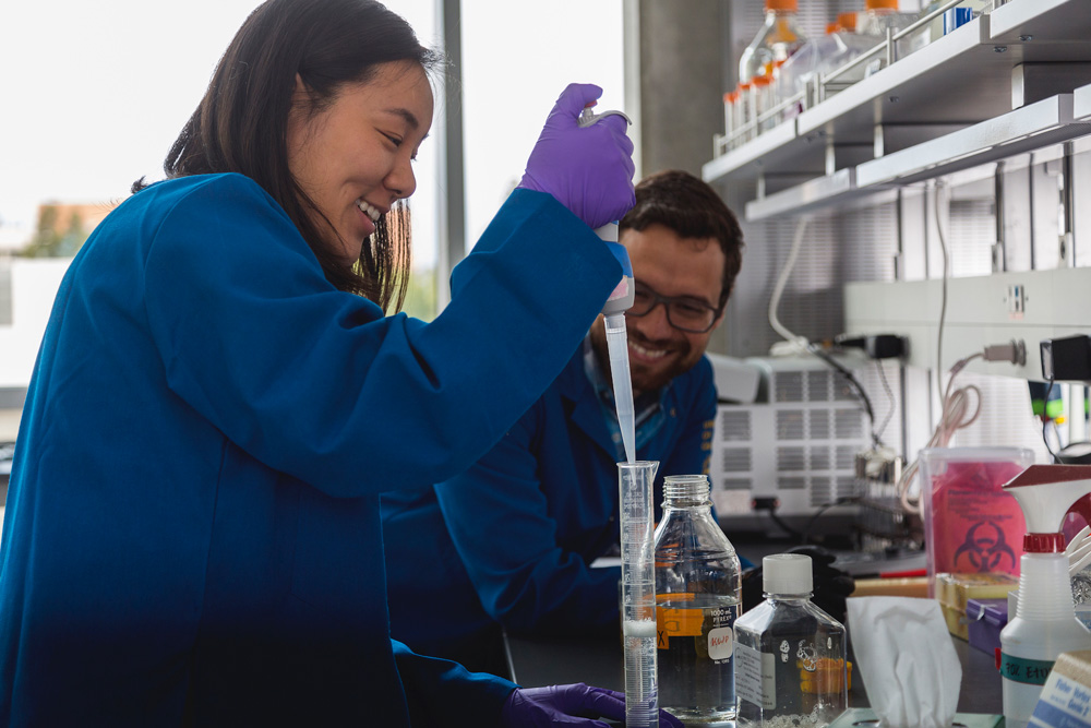 Students using pipet in lab